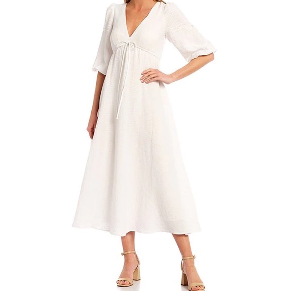 Antonio Melani
Soleil Gingham Tie V-Neck Short Elbow Puff Sleeve Midi Dress - Picture 1 of 9
